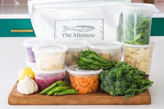 a bundle of various fresh vegetable ingredients ingredients of a meal kit