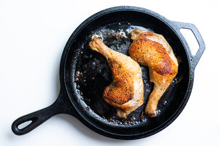 one pan chicken leg quarters in a cast iron pan